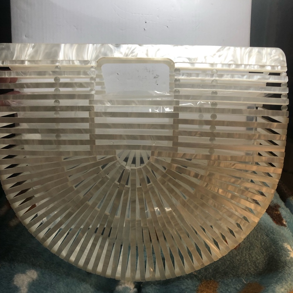 🆕 Clutch Mother of Pearl Iridescent color Clutch made by Birdy Grey
New style